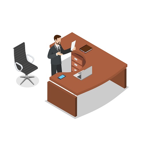 A Berry & Lamberts solicitor at a desk in the Church Road office, working through a file.